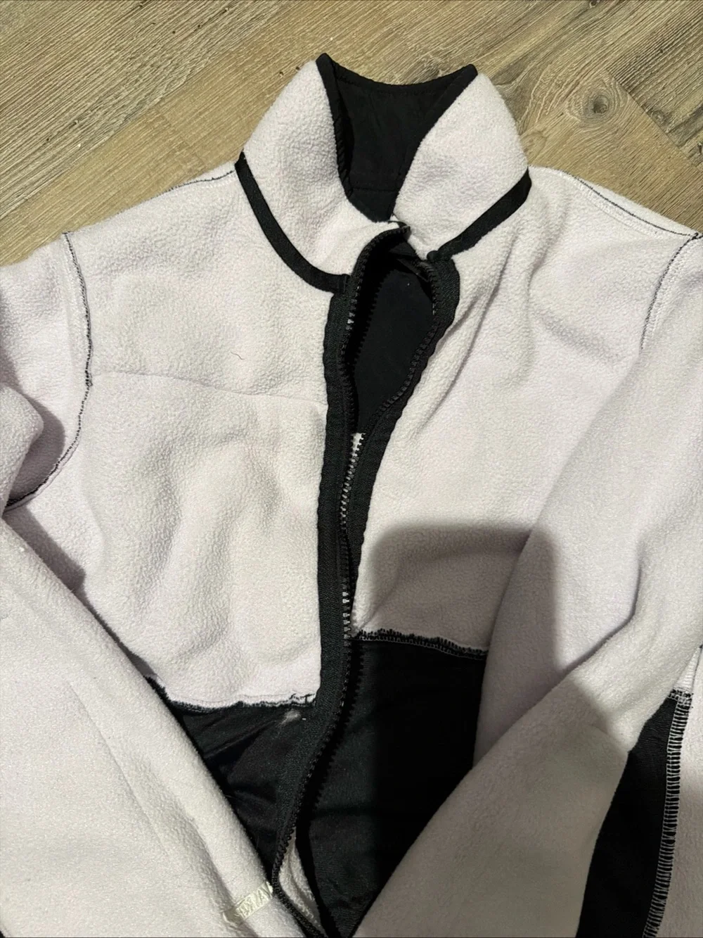 The North Face Kids Light Pink and Black Fleece Jacket